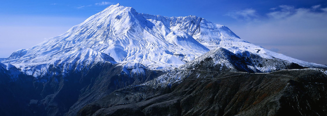 Main magnificent snowy mountains and blue sky